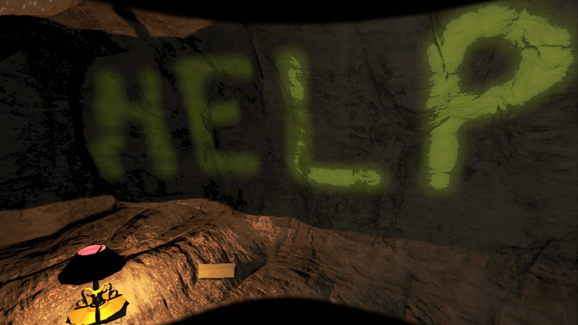 The word help spray painted on a cave wall with a fancy lamp and gold bar below it.